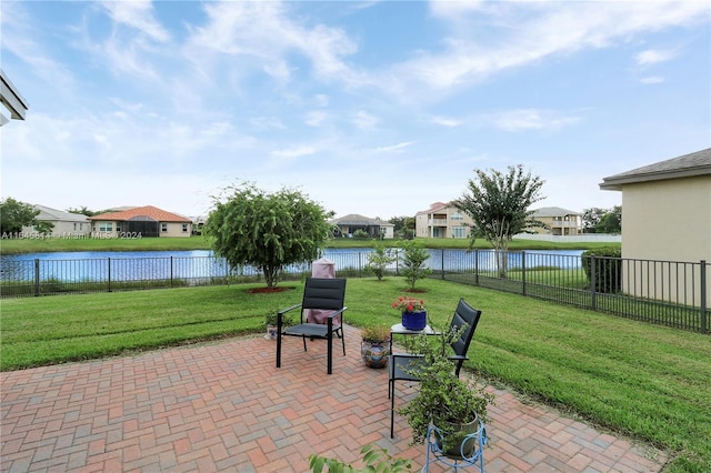 view of patio with a water view