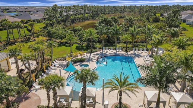 view of swimming pool with a patio area