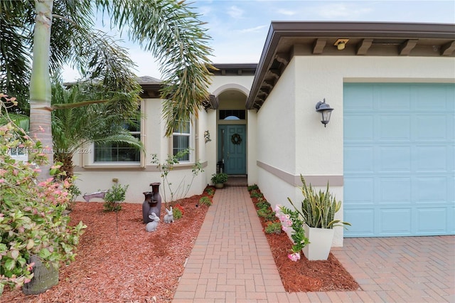 entrance to property featuring a garage