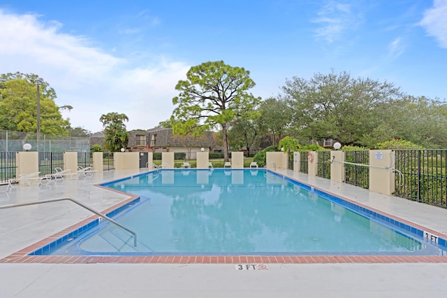 view of pool featuring a patio