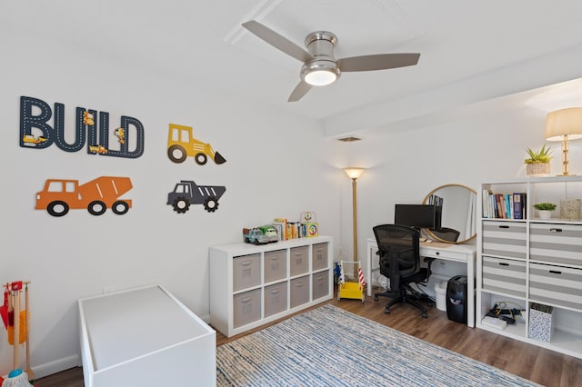 home office featuring ceiling fan and dark hardwood / wood-style flooring