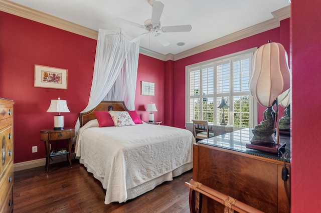 bedroom with dark hardwood / wood-style flooring, ceiling fan, and ornamental molding