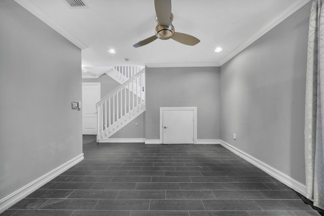 unfurnished living room featuring ceiling fan and ornamental molding