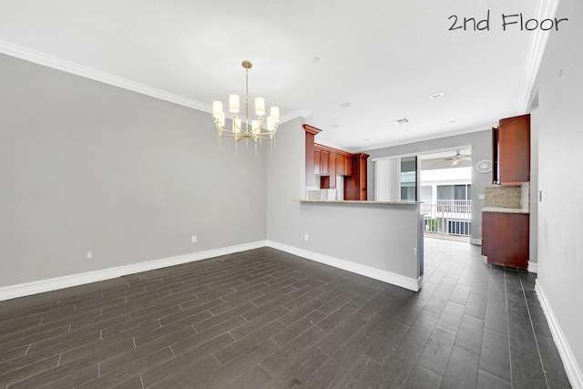 interior space featuring ceiling fan with notable chandelier, dark hardwood / wood-style floors, and ornamental molding