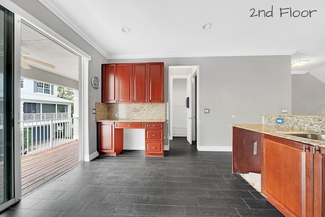 kitchen featuring tasteful backsplash, sink, ceiling fan, light stone counters, and crown molding