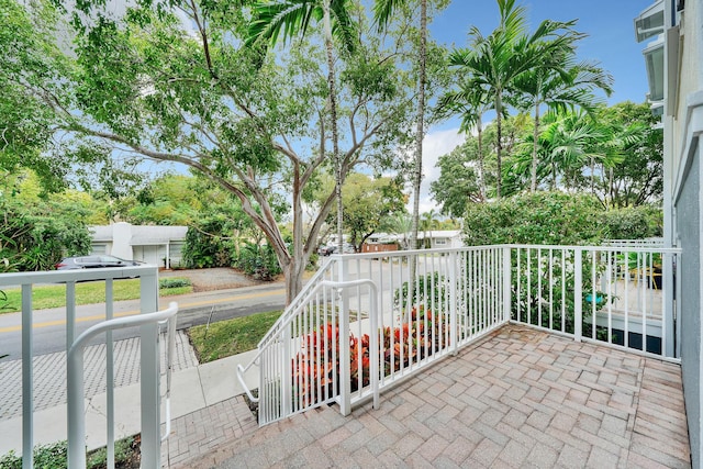 view of patio with a balcony