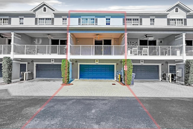 view of property featuring ceiling fan and central AC