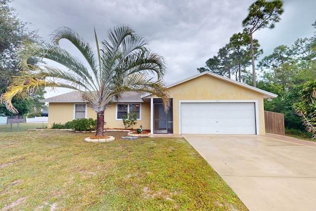 ranch-style home featuring a garage and a front lawn