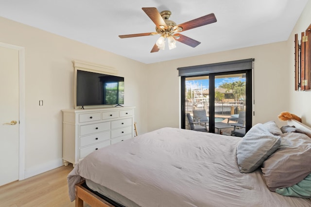 bedroom featuring access to exterior, light wood-style flooring, baseboards, and ceiling fan