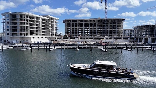 property view of water with a dock