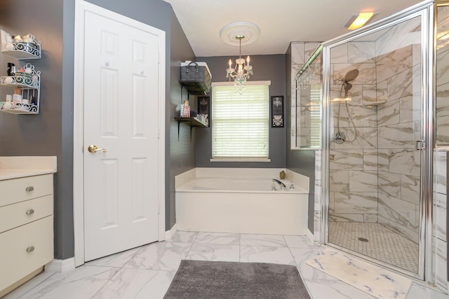 bathroom with independent shower and bath, vanity, and a chandelier