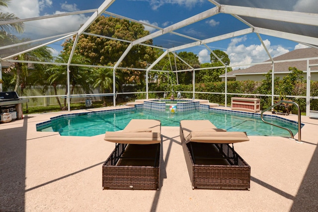 view of swimming pool featuring an in ground hot tub, area for grilling, glass enclosure, and a patio area