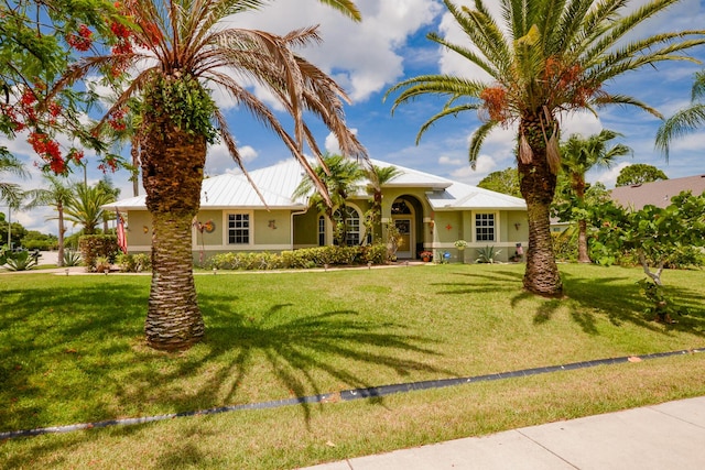 view of front of property with a front lawn