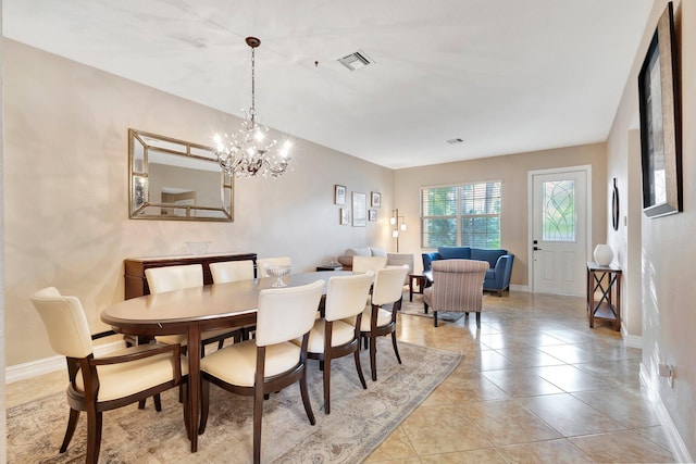 11606 Ponywalk Trl, Boynton Beach, FL 33473 - dining area featuring visible vents, baseboards, light tile patterned floors, and a chandelier