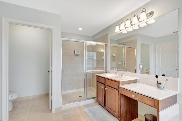 bathroom with toilet, tile patterned flooring, an enclosed shower, and vanity