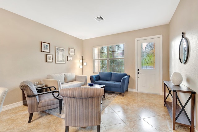 11606 Ponywalk Trl, Boynton Beach, FL 33473 - living room featuring baseboards, light tile patterned flooring, and visible vents