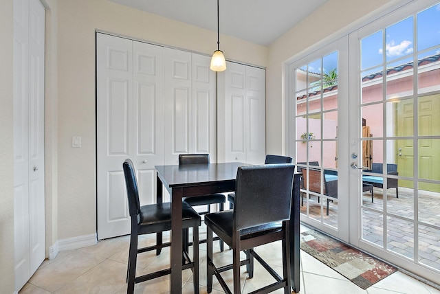 tiled dining space with french doors