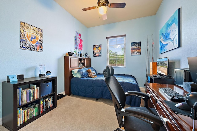 bedroom with ceiling fan and carpet floors