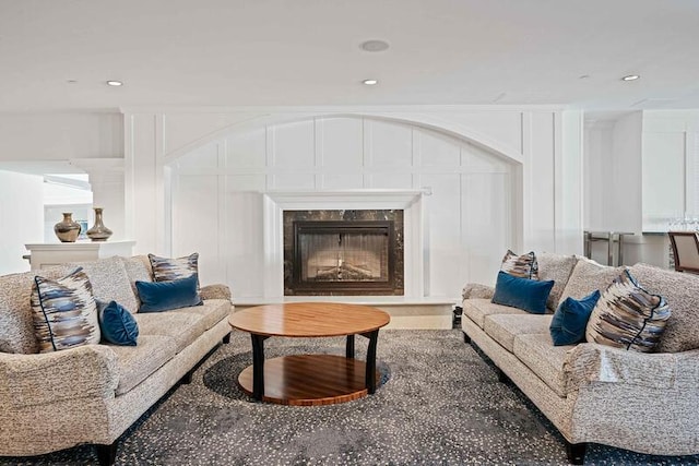 living room featuring a fireplace