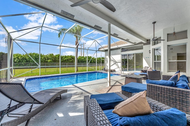 view of pool featuring a lanai, ceiling fan, outdoor lounge area, and a patio