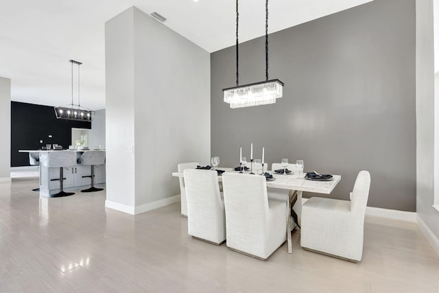 dining area with a chandelier