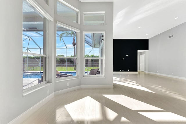 spare room featuring light wood-type flooring