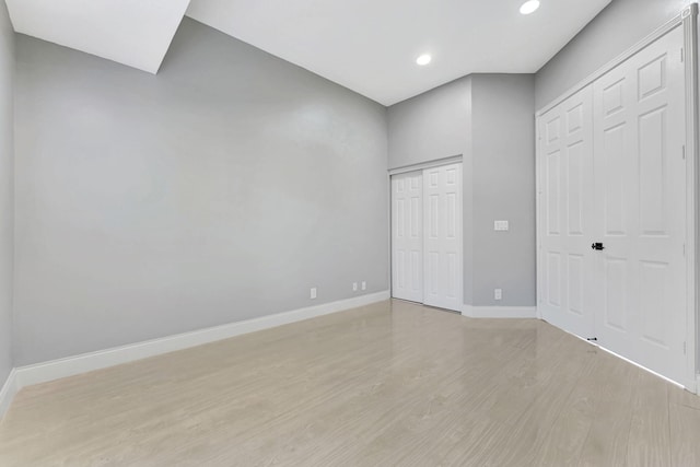 unfurnished bedroom with light hardwood / wood-style floors