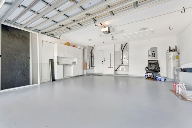 garage with water heater, a garage door opener, and electric panel