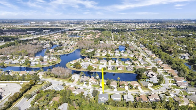 drone / aerial view featuring a water view