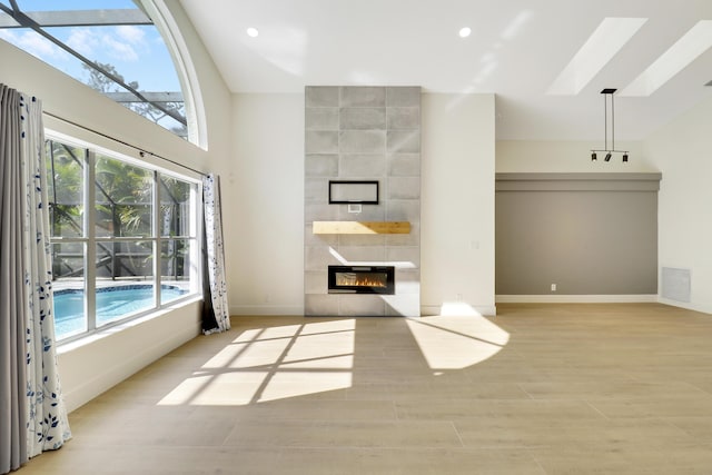 unfurnished living room with a fireplace