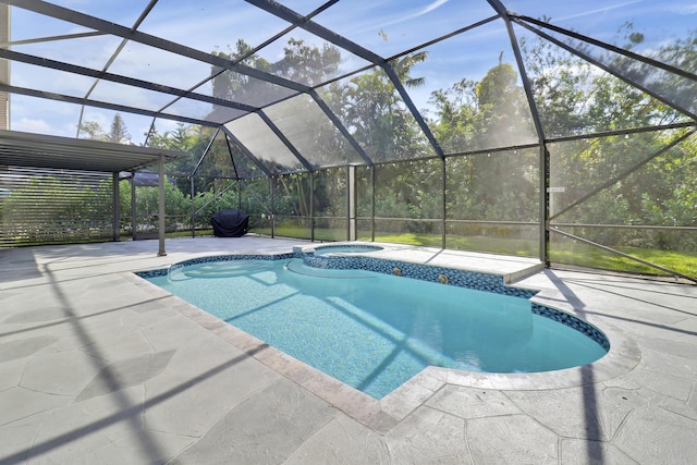 view of pool with a lanai, a patio, and an in ground hot tub