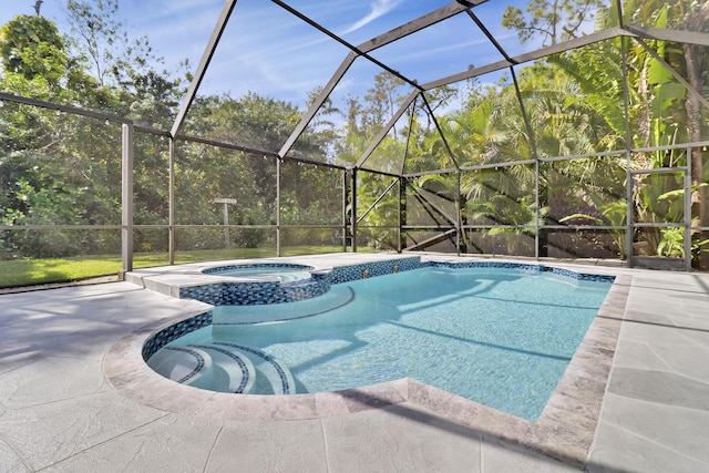 view of pool with an in ground hot tub, glass enclosure, and a patio