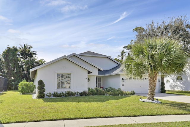 ranch-style house featuring a garage and a front yard