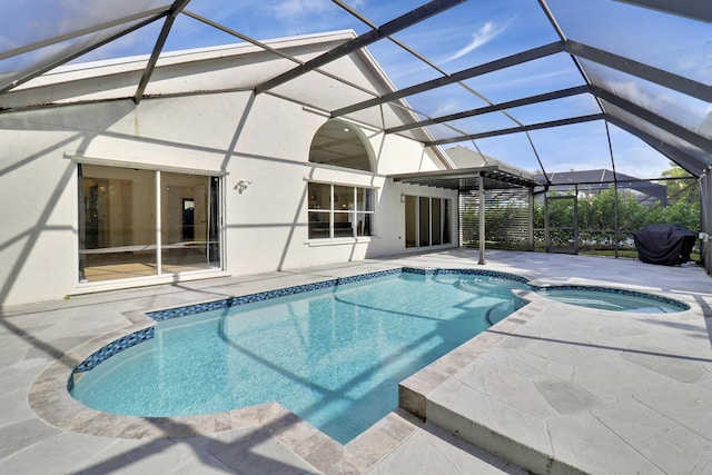 view of swimming pool with a patio area, a grill, glass enclosure, and an in ground hot tub