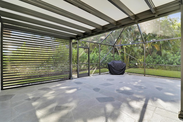 unfurnished sunroom featuring plenty of natural light