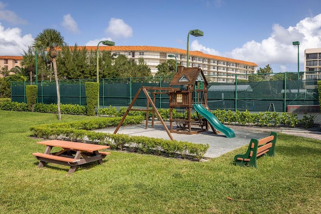 view of jungle gym featuring a yard