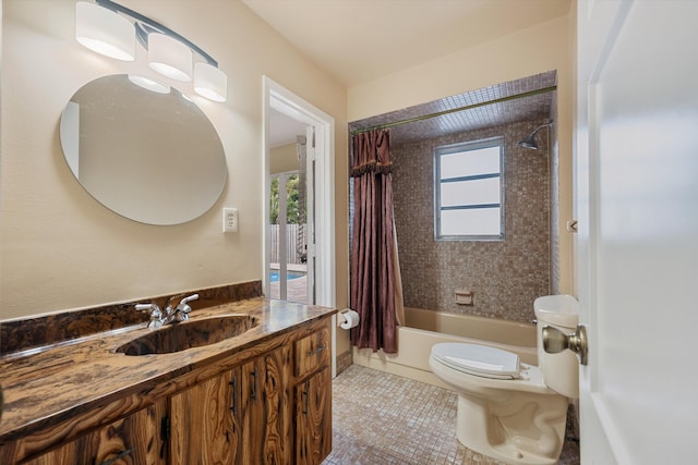 full bathroom with vanity, shower / tub combo with curtain, tile patterned floors, and toilet