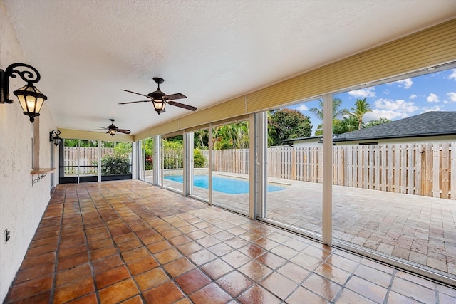 unfurnished sunroom featuring a healthy amount of sunlight