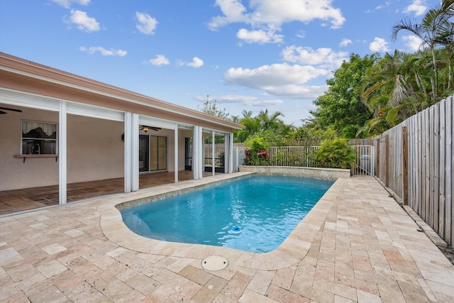 view of swimming pool featuring a patio area