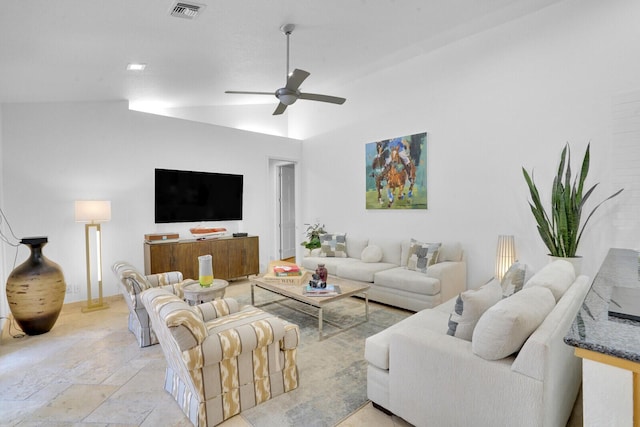 living room with ceiling fan and lofted ceiling