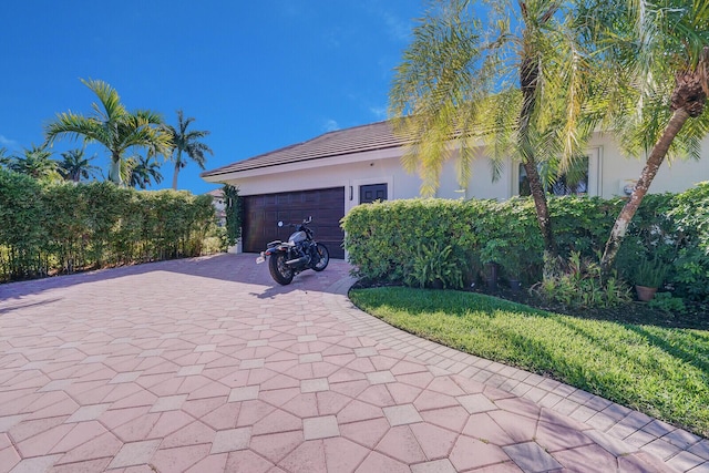 view of patio featuring a garage