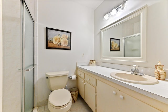 bathroom with toilet, a shower with door, vanity, and tile patterned flooring