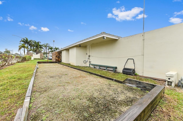 view of home's exterior featuring a yard