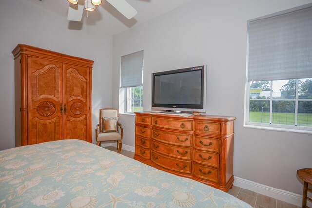 bedroom featuring ceiling fan and light hardwood / wood-style flooring