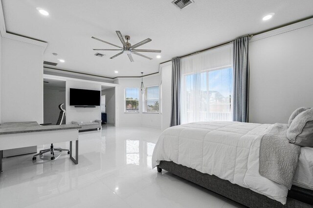 bathroom featuring vanity, tile patterned flooring, shower / bath combination with curtain, and a textured ceiling