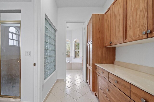 office featuring ceiling fan and ornamental molding