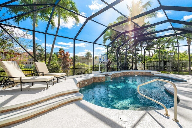 view of swimming pool featuring a lanai and a patio