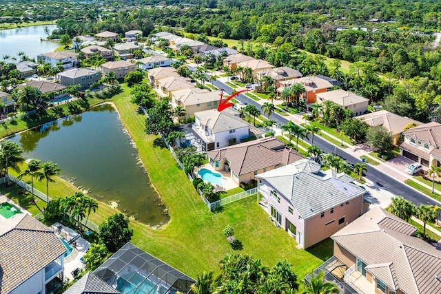 drone / aerial view with a water view