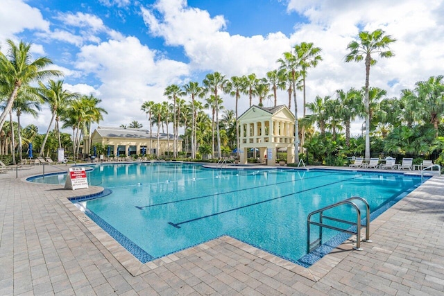 view of swimming pool with a patio area