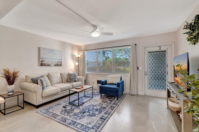 living room featuring ceiling fan